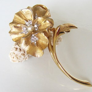 Gold-tone pansy brooch with crystal and pearl accents