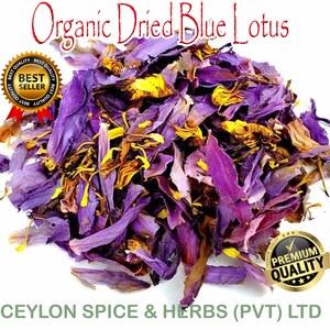 Pile of dried blue lotus flowers with purple and yellow petal pieces