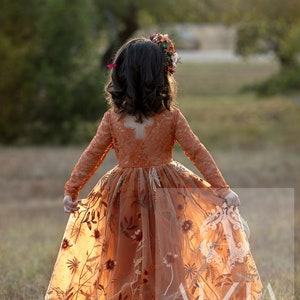 Girls tulle flower girl dress in burnt orange, long sleeves, floral embroidery and tulle skirt