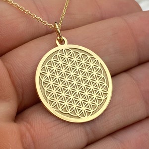 14k solid gold pendant necklace with round Flower of Life symbol charm