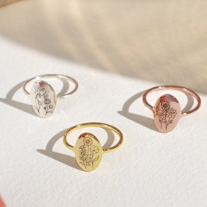 Birth flower rings set with tree motif, rose, gold, and silver tones, adjustable band