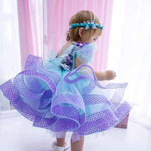 Infant floral tulle tutu dress with layered ruffles, blue and lavender, back view