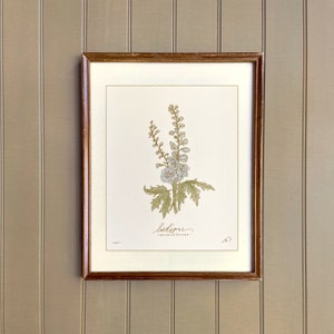 Framed botanical art print with hand-drawn larkspur flowers and leaves