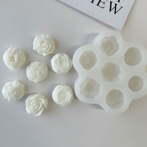 Miniature flower silicone mold with white rose and petal cavity shapes