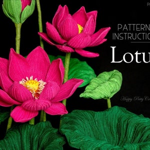 Pink crochet lotus flowers with yellow centers and green leaf crochet accents