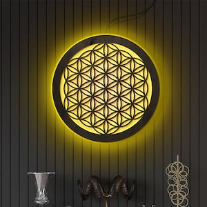 Flower of life LED wall art, circular black frame with glowing golden geometry design