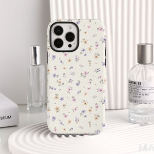 Pastel floral protective phone case with cutouts for camera and flash