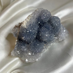 Sparkly amethyst drusy crystal cluster with textured crystal surface