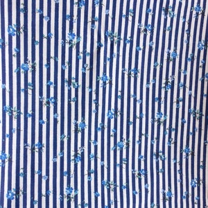 Cotton fabric with blue vertical stripes and small delicate flower pattern