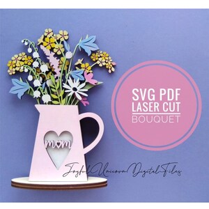 Layered wildflower bouquet SVG design with vase, 'mom' heart tag, laser-cut style