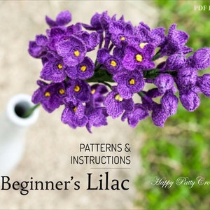 Crochet lilac flower pattern with purple blossoms and yellow centers for home decor