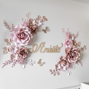 Pink rose paper flower wall decor with butterflies and gold 'Anita' name centerpiece