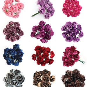 Set of miniature paper tea rose flowers in assorted colors, multiple blooms on display