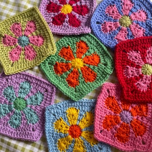 Retro flower crochet square pattern tiles in purple, red, blue, and green