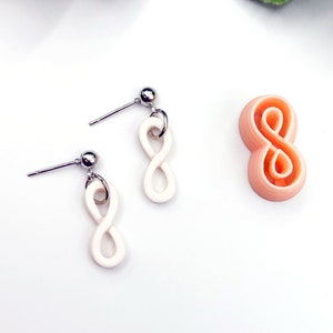 Infinity symbol polymer clay cutter, long skinny loop shape with sample earrings