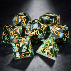 Honey bee and flowers themed polyhedral dice set with dark green and gold numbers