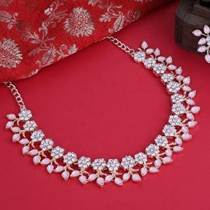 Rhinestone floral necklace with red heart-shaped stones, silver-tone chain