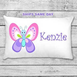 White personalized butterfly pillowcase with pink-purple butterfly and 'Kenzie' text