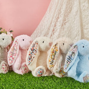 Personalized stuffed bunny plush toy with embroidered patch on side, pastel colors