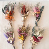 Set of mini dried flower bouquets with mixed blooms, natural stems, and twine ties