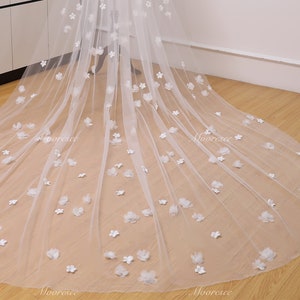 Ivory sheer wedding veil with scattered 3D flower appliques