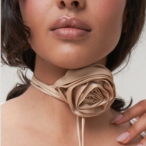 Beige satin rose choker with tied neck ribbon and large fabric flower detail