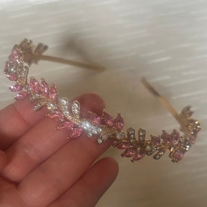 Pink and gold rhinestone headband with sparkling crystal floral design