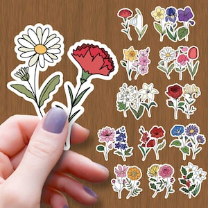 Glossy waterproof flower vinyl sticker, hand holding a white daisy with yellow center