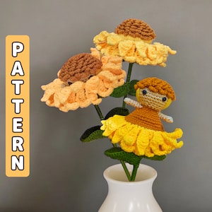 Crochet amigurumi sunflower fairy doll with yellow skirt and brown hat on green leaves