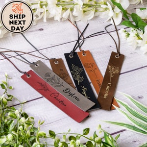 Set of leather birth-flower bookmarks with engraved initials and quotes, hanging tags
