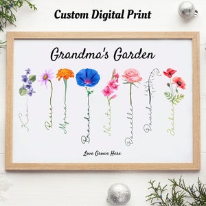 Framed wall print with handwritten “Grandma’s Garden” and colorful month-flower silhouettes
