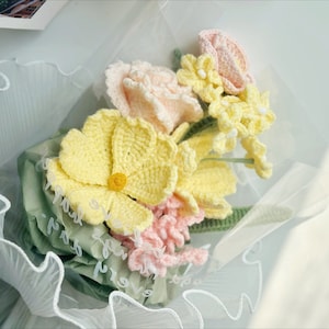 Crochet flower bouquet with pastel yellow, pink and white flowers