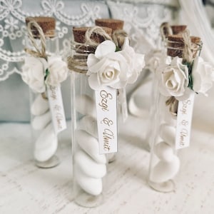 Party candy test tubes with cork tops and white ribbon labels