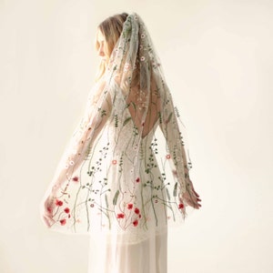 Embroidered floral bridal veil with sheer tulle and scattered rose motifs