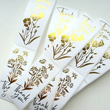 100 x Large metallic gold thankyou stickers with flowers. 8 x 3cm. 2 designs you get half of each. Ships from Cornwall FREE UK DELIVERY
