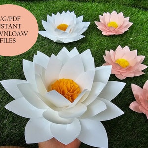 White paper lotus flower cutout with orange center and layered petals, craft template set