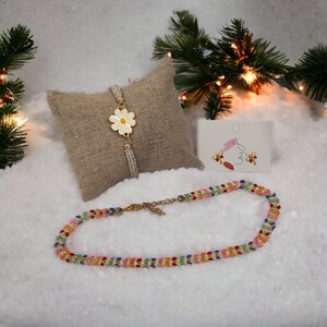 Children's beaded jewelry kit with multicolor necklace/bracelet, pouch, and flower card