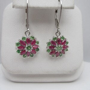 Silver flower dangle earrings with red marquise stones and green accents, lever backs