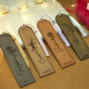 Set of engraved wooden birth-flower bookmarks with name text and tassels