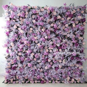 Lilac and purple flower wall backdrop with dense small blossoms