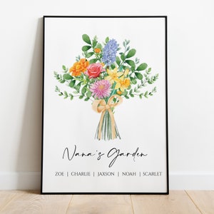 Framed floral garden print with colorful bouquet in vase and handwritten text at bottom