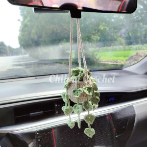 Crochet hanging plant charm set with small green monstera leaves for car mirror