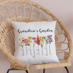 Personalized lumbar pillow with 'Grandma's Garden' text and flower chart