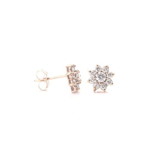14k gold diamond flower stud earrings with prong setting and push-back backs