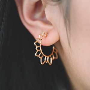 Gold flower sunburst stud post earrings, round layered design