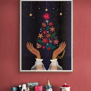 Framed holiday wall art print with starry background, ornament tree, and antler hands