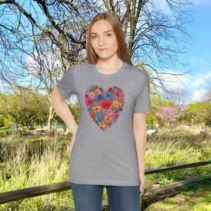 Heather gray unisex short-sleeve T-shirt with colorful heart flower print on front