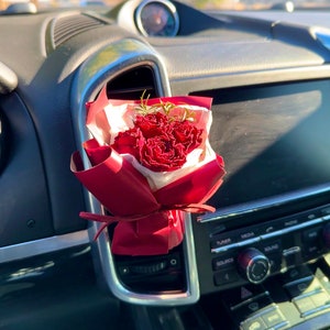 Car vent clip scent diffuser with mini red dried flower bouquet and red ribbon