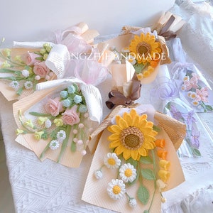 Handmade crochet flower bouquet with sunflower and daisy blossoms in wrapped display