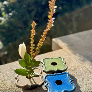 Handmade ceramic ikebana vase with blue kenzan frog holder